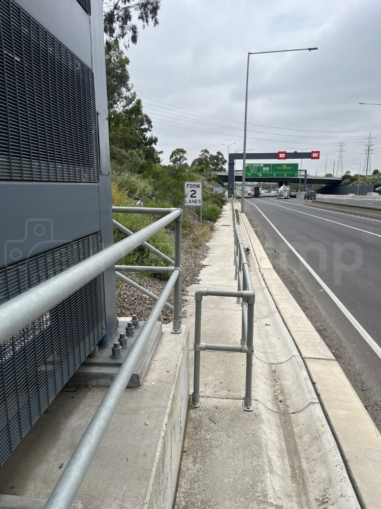 Interclamp galvanised two rail systems installed next to a highway to provide a safety barrier to highway staff